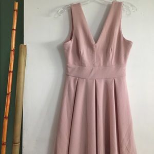 Selling this pretty blush dress never worn. $10.00